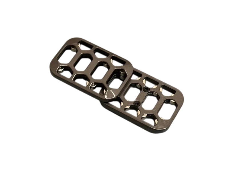 Arca magnetic fidget slider with its two open-frame plates offset diagonally.