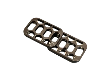 Arca magnetic fidget slider with its two open-frame plates offset diagonally.