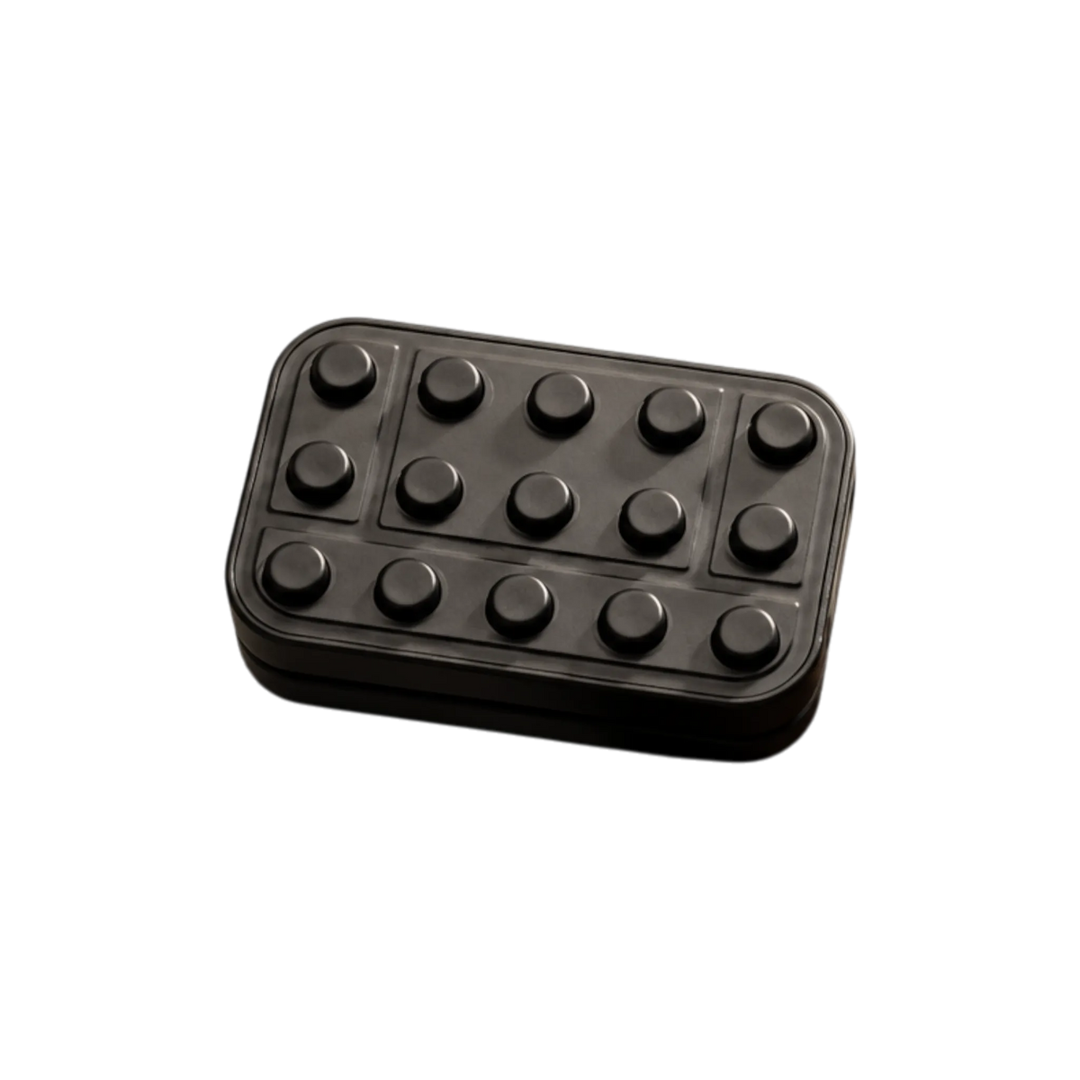 Brix magnetic fidget slider with raised round studs, rectangular outlines, and rounded corners.