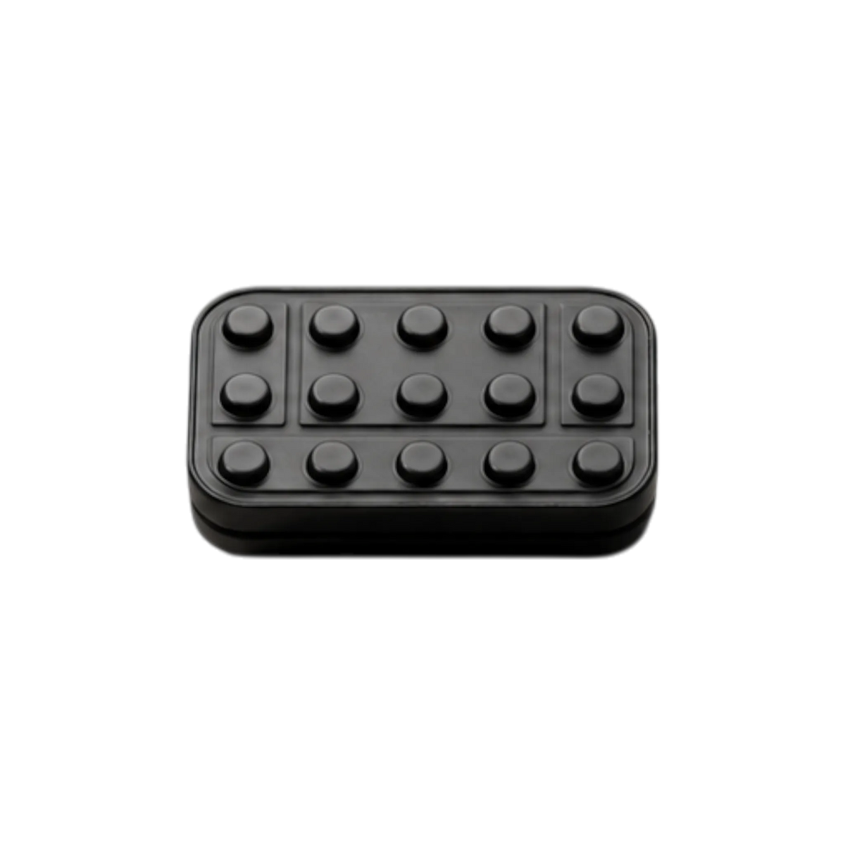 Front view of the Brix fidget slider showing rows of raised studs and rectangular outlines.