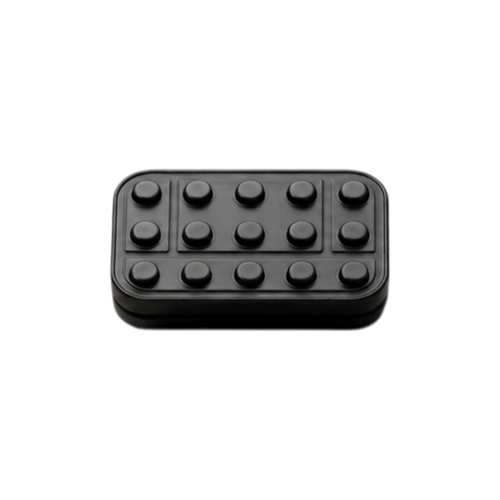 Front view of the Brix fidget slider showing rows of raised studs and rectangular outlines.