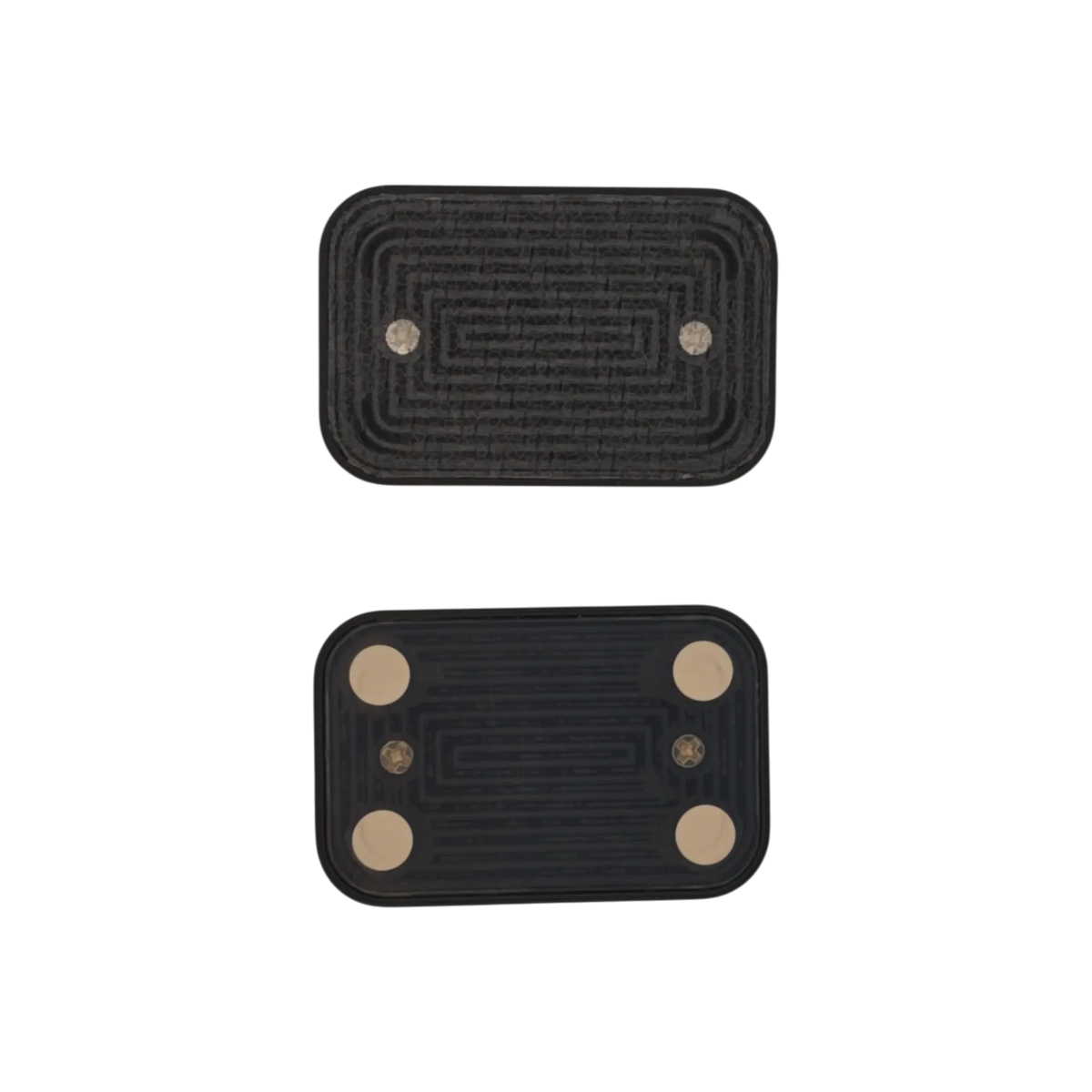 Two separated Brix slider plates on a plain background, with patterned sliding faces and four pale corner pads on the lower plate.