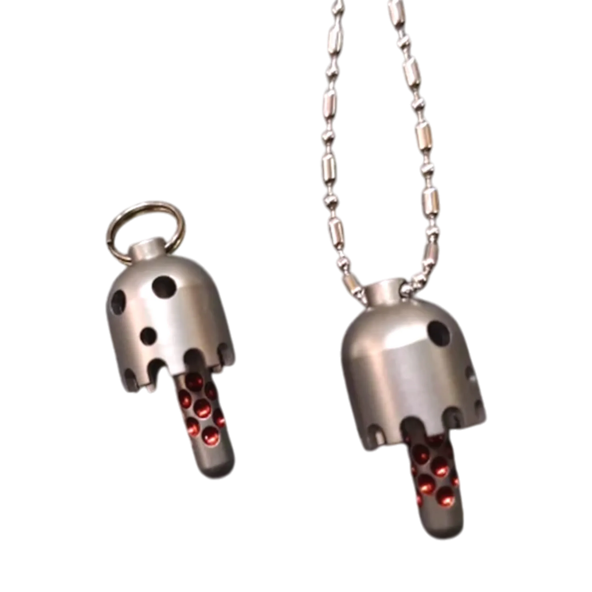 Two Daze bell pendants showing ring and chain attachment options.