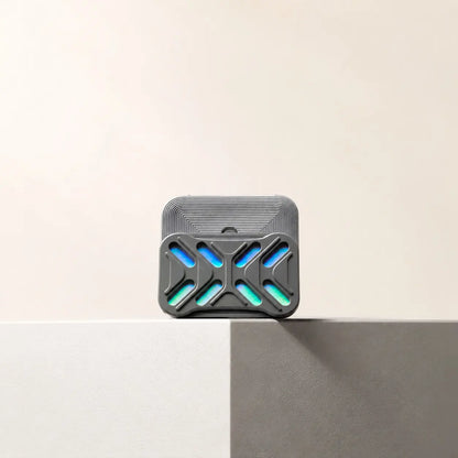 Gleam magnetic slider standing on the edge of a pale ledge with its back plate offset.