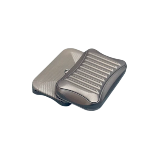 Stria magnetic fidget slider with offset plates showing broad grooves and fine lines.