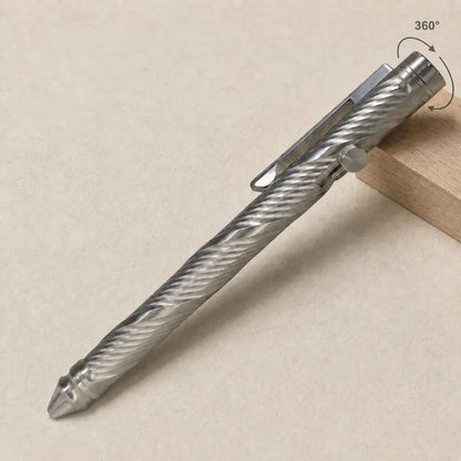 Whorl pen on a pale stone block, with an arrow beside the tail spinner